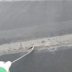 Bad seam on low slope roof - needs seam repaired